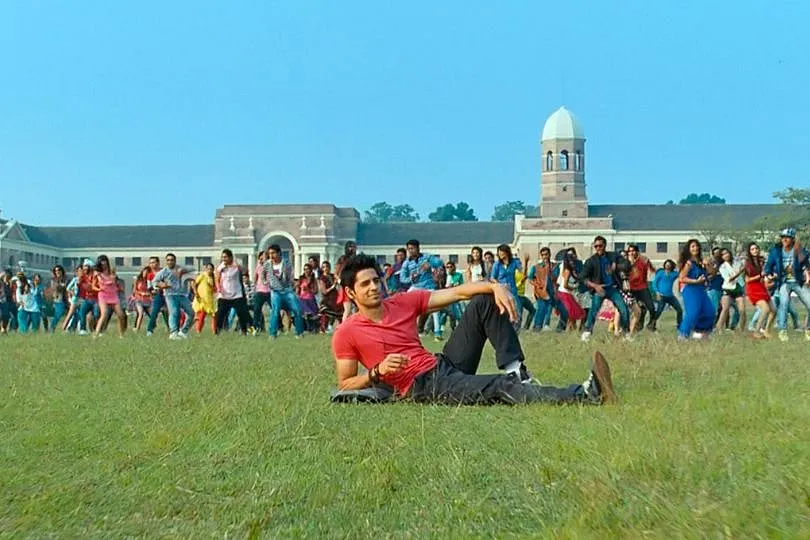 A scene from Student of the Year One where St. Teresa's College is a fancy, utopian placeholder for real life institutions 